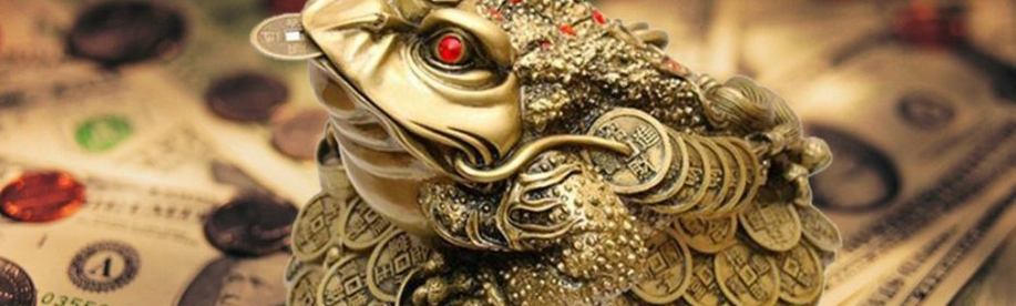 A frog with a coin in your mouth - a talisman to attract money